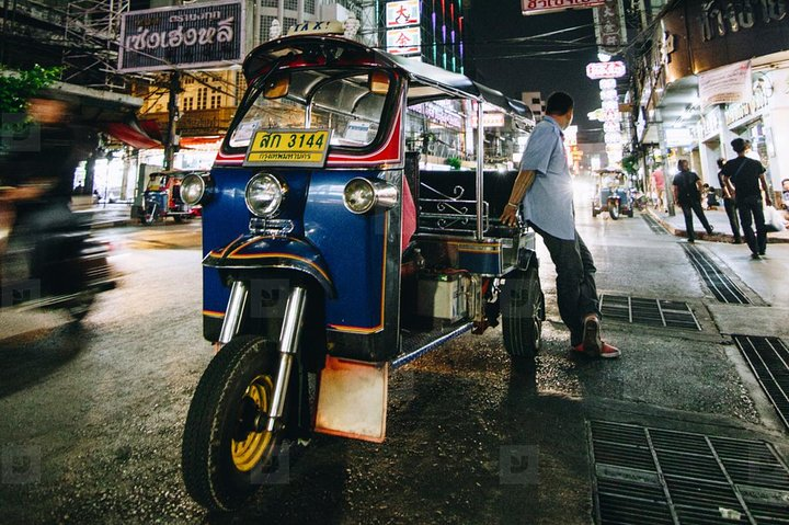 Explore the lively streets of Bangkok’s Chinatown where illuminated signs guide you to delicious street food and traditional markets all accessed by the iconic tuk tuk. A true culinary adventure awaits!
