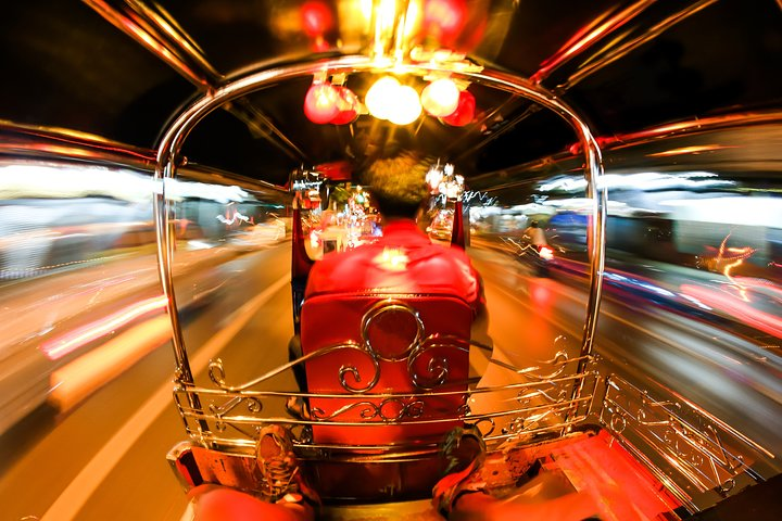 Experience the exhilaration of navigating Bangkok's lively streets by Tuk Tuk discovering local flavors and sights all while soaking in the night’s unique charms. Embrace adventure!