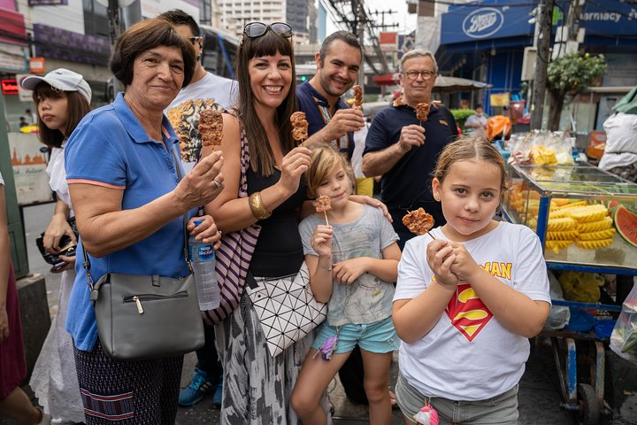 Savor authentic Thai flavors as you explore hidden culinary gems in Bang Rak indulging in delightful street treats and traditional desserts all while enjoying the company of fellow food lovers.