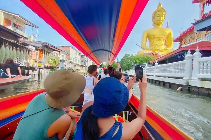 Explore the serene canals of Bangkok as you glide past stunning temples and the majestic Big Buddha immersing yourself in the city's rich cultural tapestry. Discover hidden gems from the water!