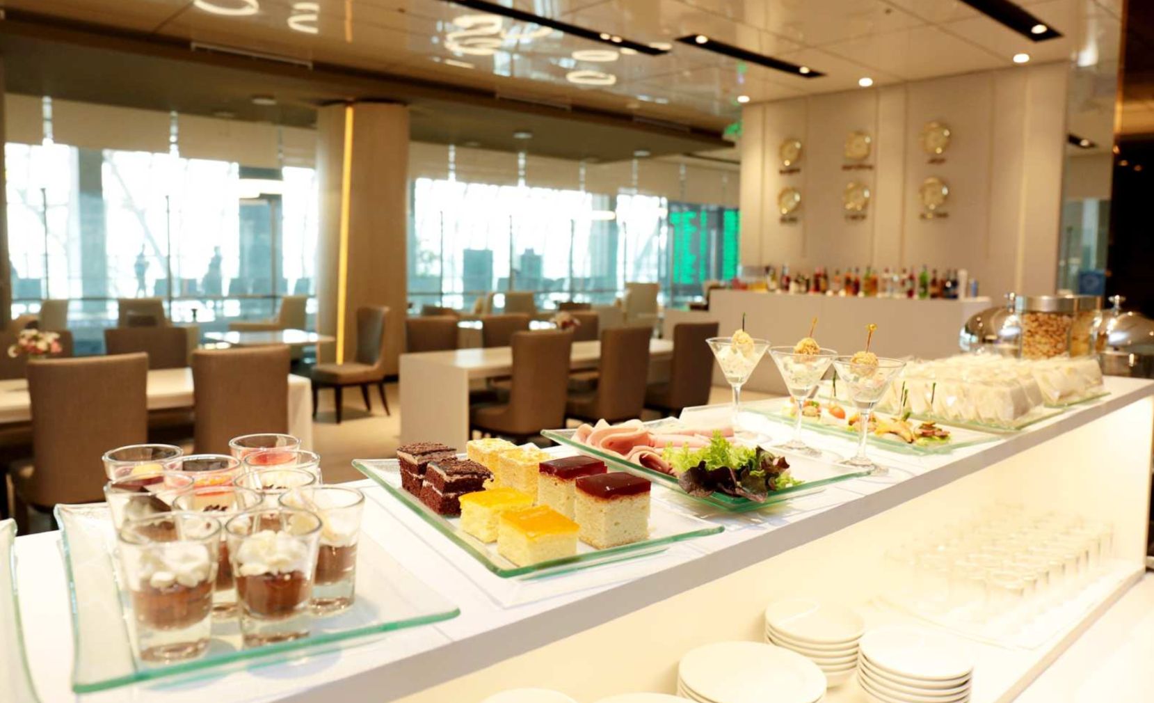 Recharge in comfort at Miracle Lounge where delicious snacks meet ample seating and stunning views. A perfect spot to relax and get ready for your next adventure.