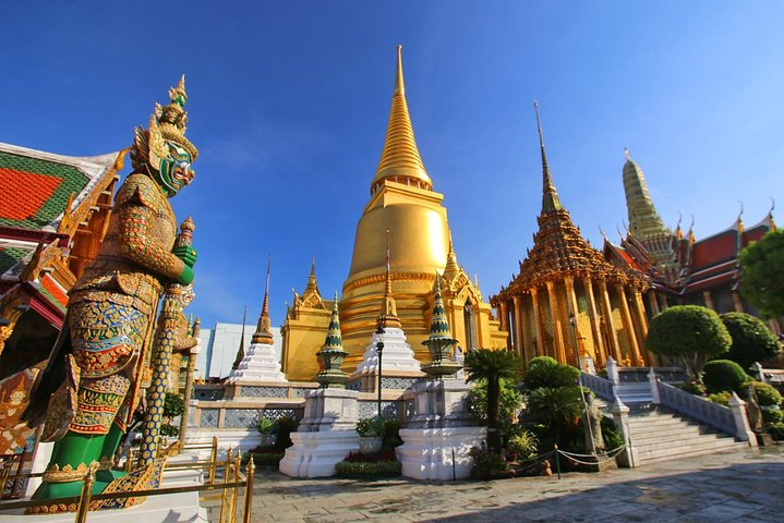 Marvel at the stunning golden spires of the Grand Palace where history and architectural beauty come together inviting travelers to explore the rich heritage of Bangkok.