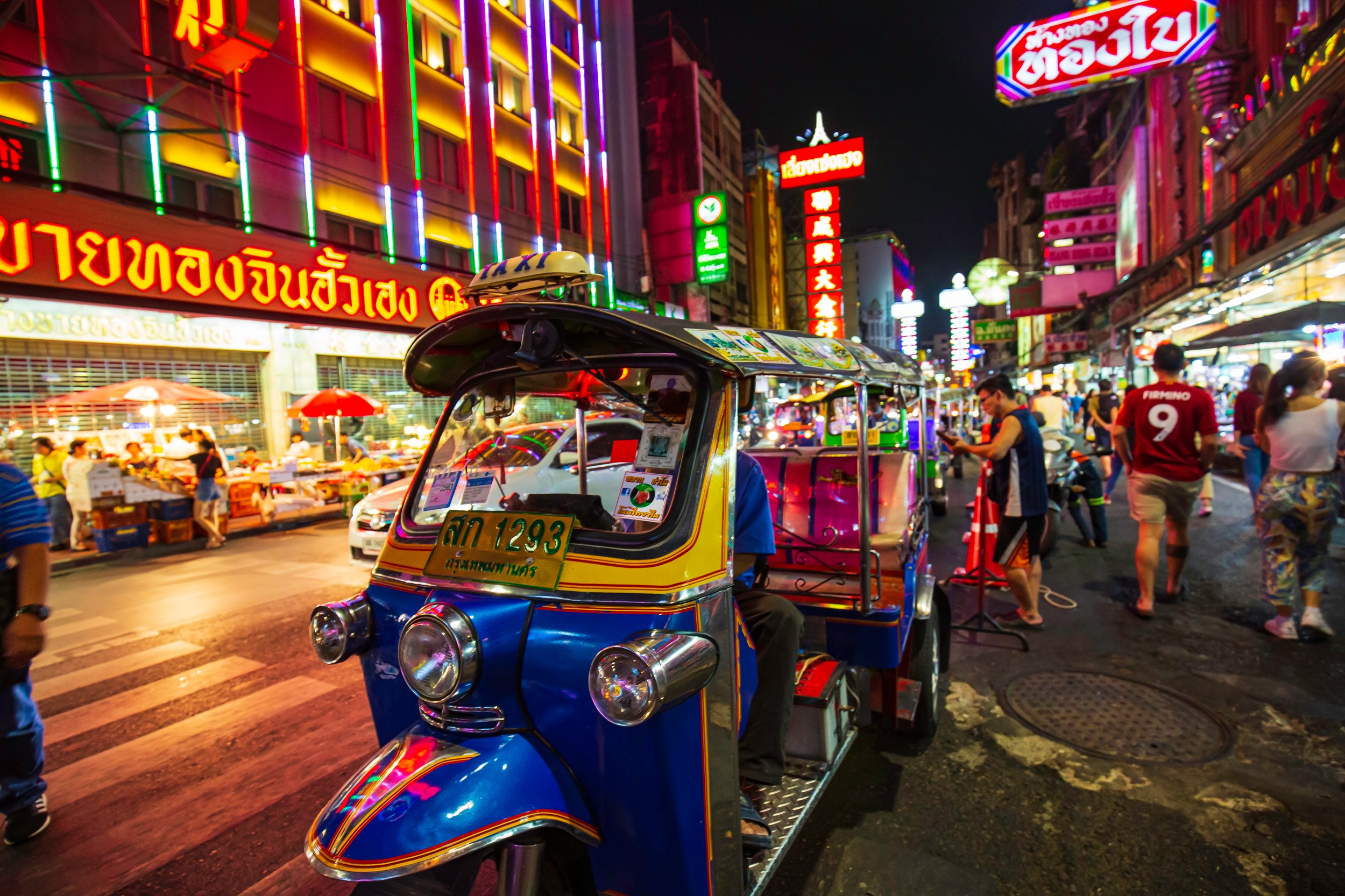 Experience the lively energy of Bangkok nights as tuk-tuks zip through illuminated streets leading you to delicious street food and iconic landmarks. The city reveals its charm after sunset.