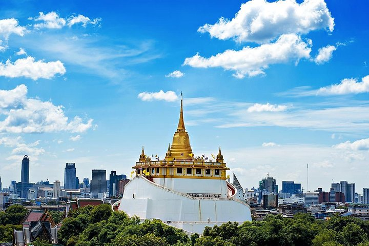 Experience the essence of Bangkok with its iconic temples and bustling markets. Discover the Golden Mount's stunning views and immerse yourself in the cultural richness of Chinatown and the Flower Market.