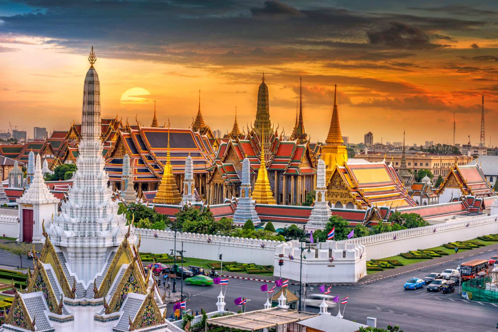 Experience the beauty of Bangkok’s iconic landmarks at dusk. Discover intricate architecture and rich history as the sun sets painting the sky over the Grand Palace and Wat Arun.