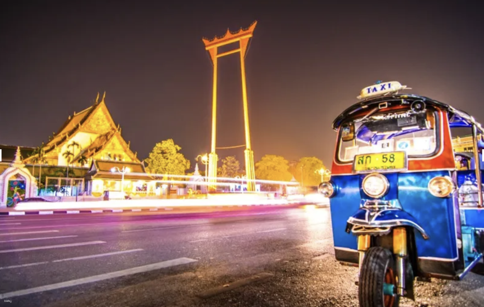 Experience Bangkok's nightlife from a tuk-tuk exploring illuminated temples lively markets and savoring delicious street food amidst the city's iconic highlights and local charm.