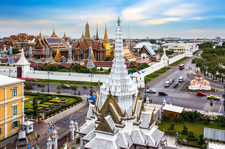Explore the stunning architecture and lively streets of Bangkok experiencing its unique culture and diverse transportation options while discovering the city's rich history and vibrant local life.
