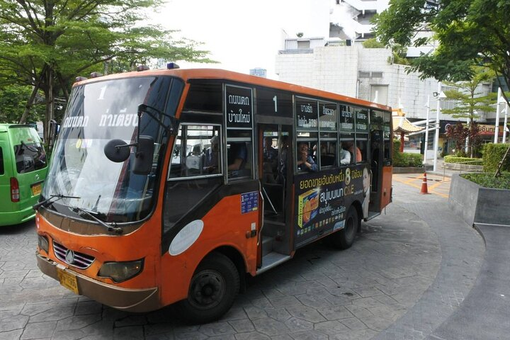 Explore Bangkok's charm with local transport experiencing daily life firsthand. Ride the bus meet locals and uncover hidden gems beyond the tourist path for a true taste of the city.