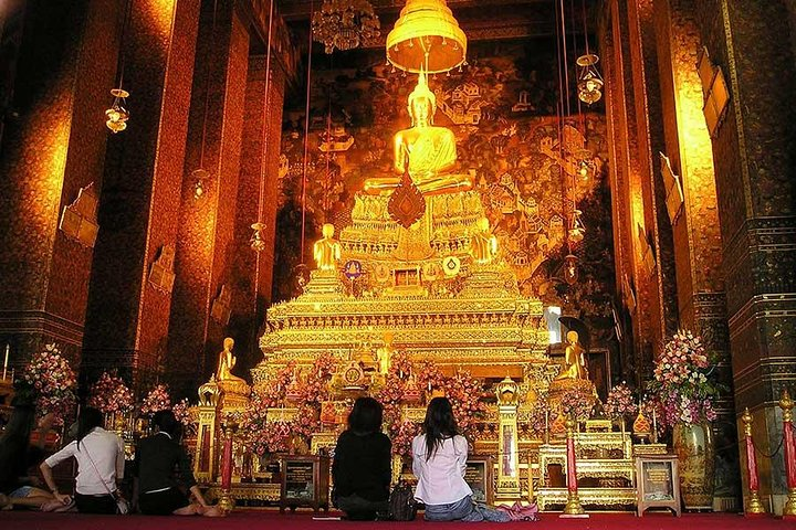 Experience the awe of golden Buddha statues and intricate temple architecture as you explore Bangkok's rich cultural heritage and serene landscapes in this unforgettable journey through the city.