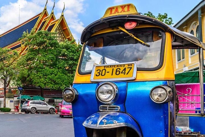 Experience the charm of Bangkok’s streets aboard a tuk-tuk exploring iconic sights and indulging in authentic Thai street food all while enjoying a leisurely ride through the city.
