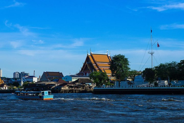 Experience the charm of Bangkok's riverside where traditional temples and local life blend seamlessly. Enjoy a scenic boat ride exploring hidden gems along the Chao Phraya River.