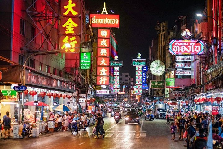 Experience the lively streets of Bangkok's Chinatown filled with mouthwatering food colorful shops and the unmistakable buzz of local life. Discover hidden gems at every corner on this remarkable journey.