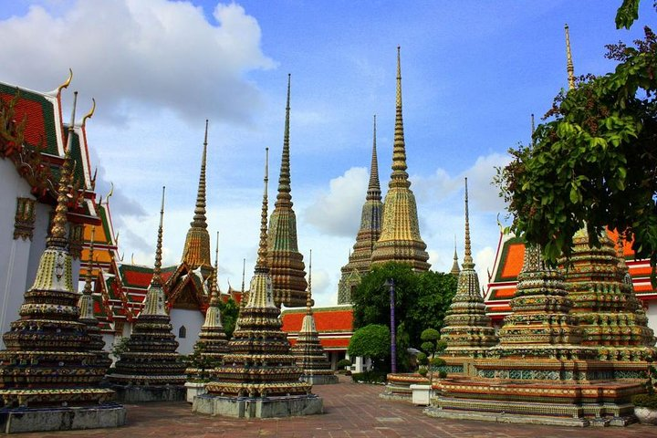 Marvel at the stunning architecture and intricate details of Bangkok's Buddhist temples a perfect backdrop for mingling with locals and soaking in the city's rich traditions.