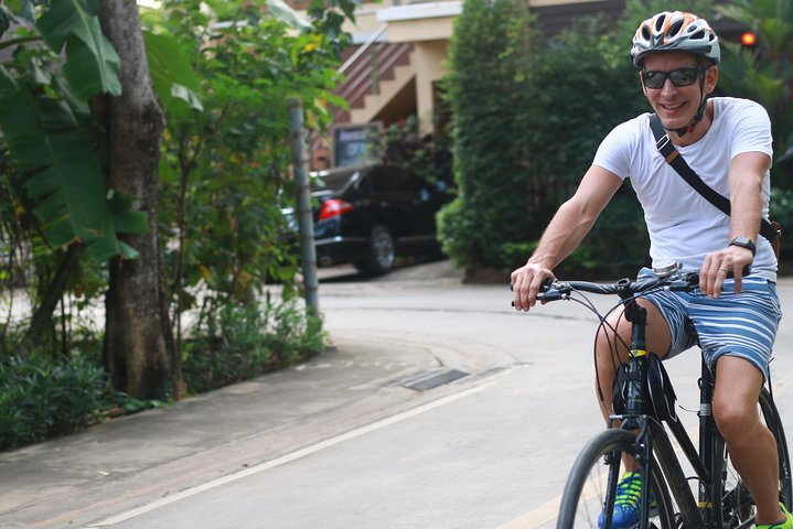 Explore the hidden gems of Thonburi by bicycle pedaling through local markets quaint temples and experiencing the warmth of the community all while savoring home-cooked Thai delights.
