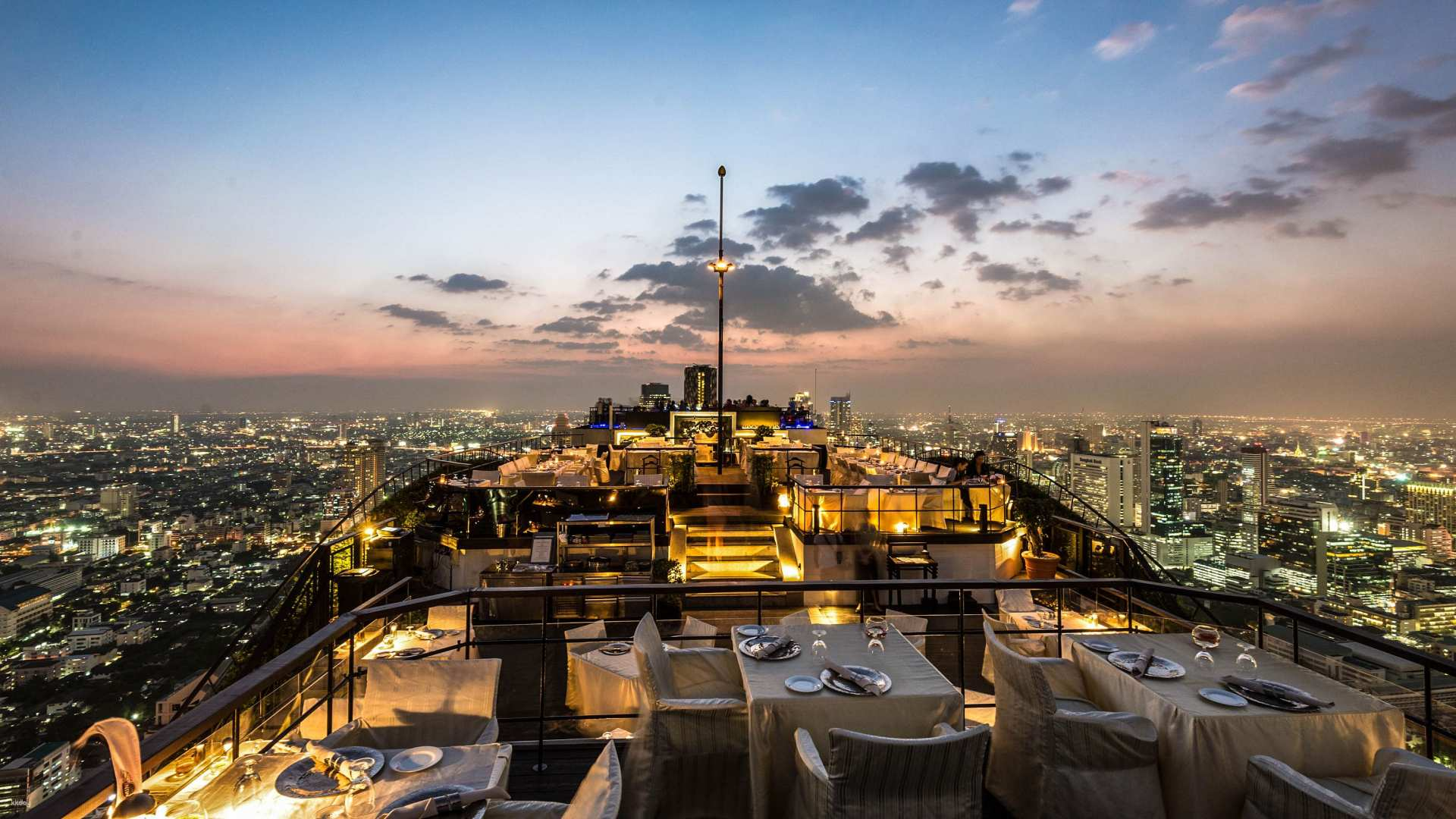 Dine under the stars atop Bangkok at the Banyan Tree's Vertigo. Relish exquisite cuisine while soaking in panoramic city views creating unforgettable memories amidst luxury and elegance.