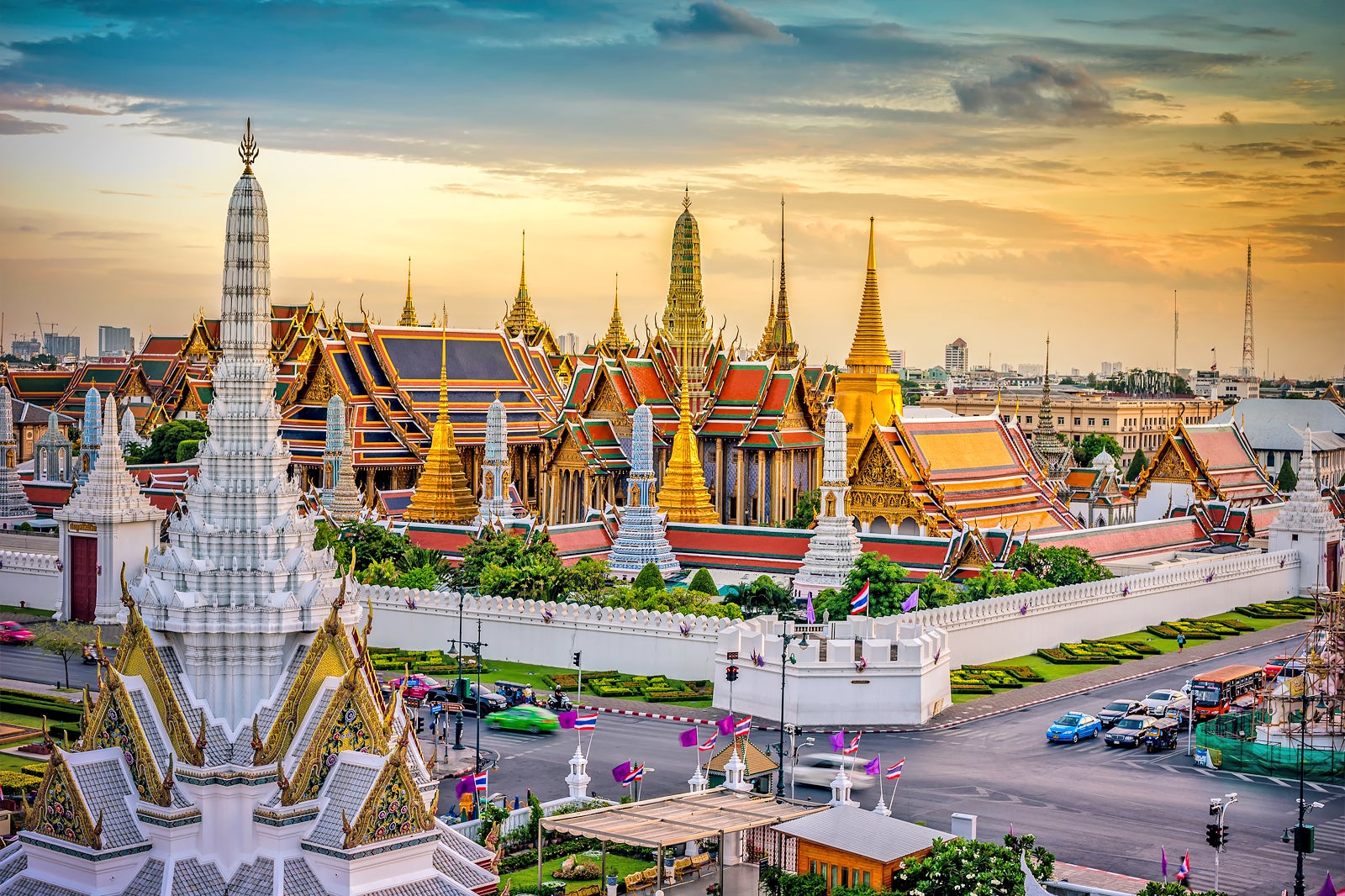 Experience the stunning architecture of the Grand Palace with its intricate details and golden spires as you immerse yourself in Bangkok's rich cultural heritage and vibrant street life.