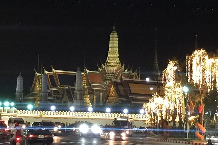 Experience the glow of Bangkok's illuminated temples while savoring delicious local street food. Cycle through stunning landmarks creating unforgettable moments filled with flavor and culture.