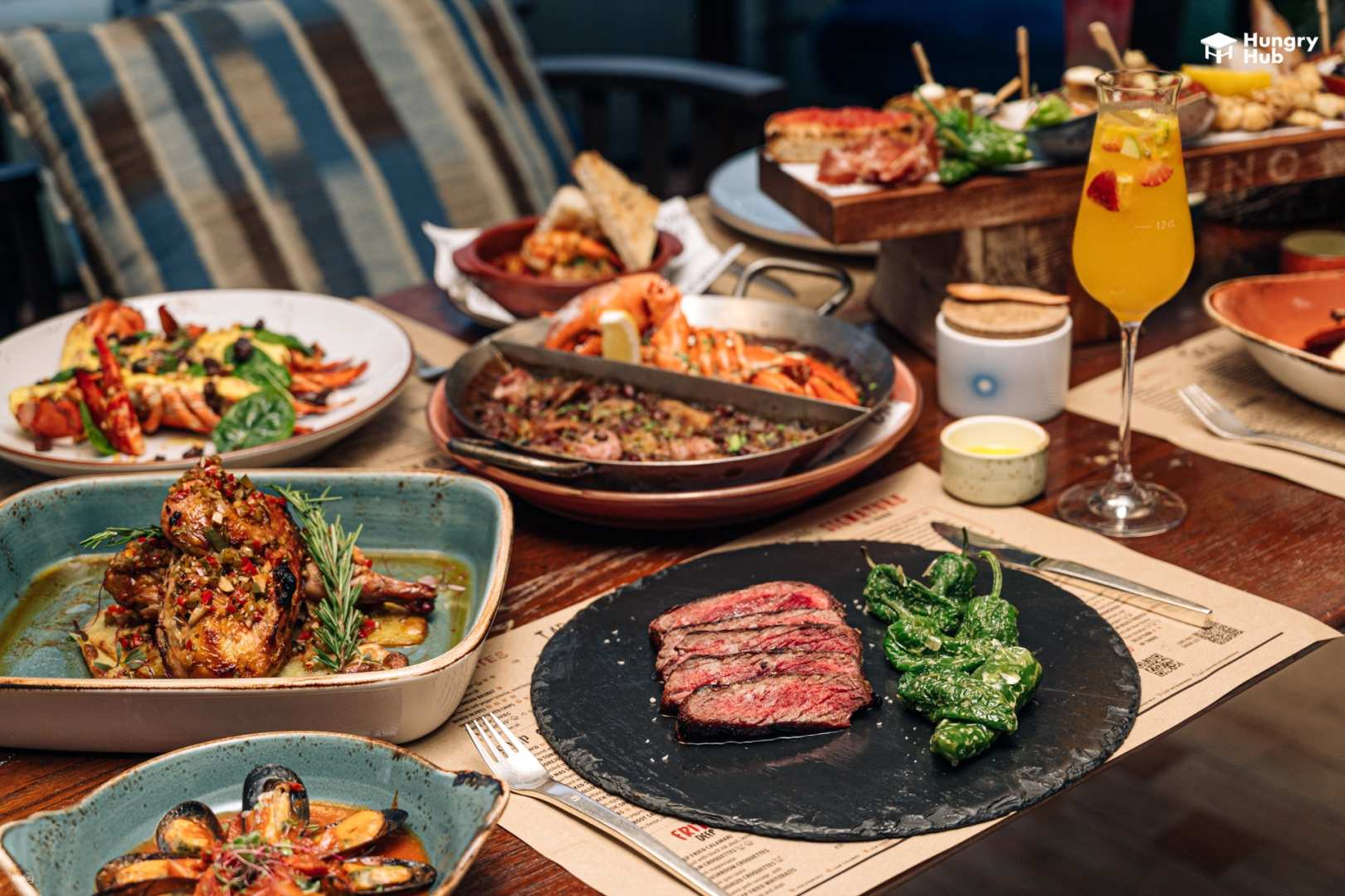 Savor a delightful culinary journey at UNO MAS enjoying Mediterranean flavors while relishing stunning views of Bangkok's skyline with exquisite seafood and grilled specialties. Indulge in memorable dining moments!