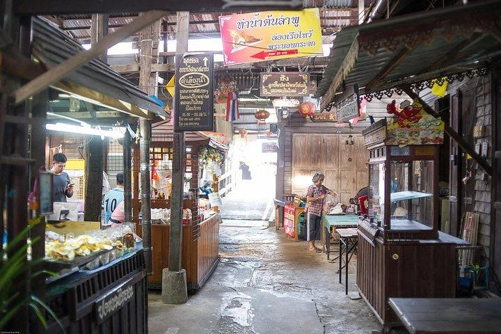 Explore the lively lanes of Ban Mai Market where local vendors offer delicious snacks and unique treasures reflecting the rich cultural tapestry of Chachoengsao.