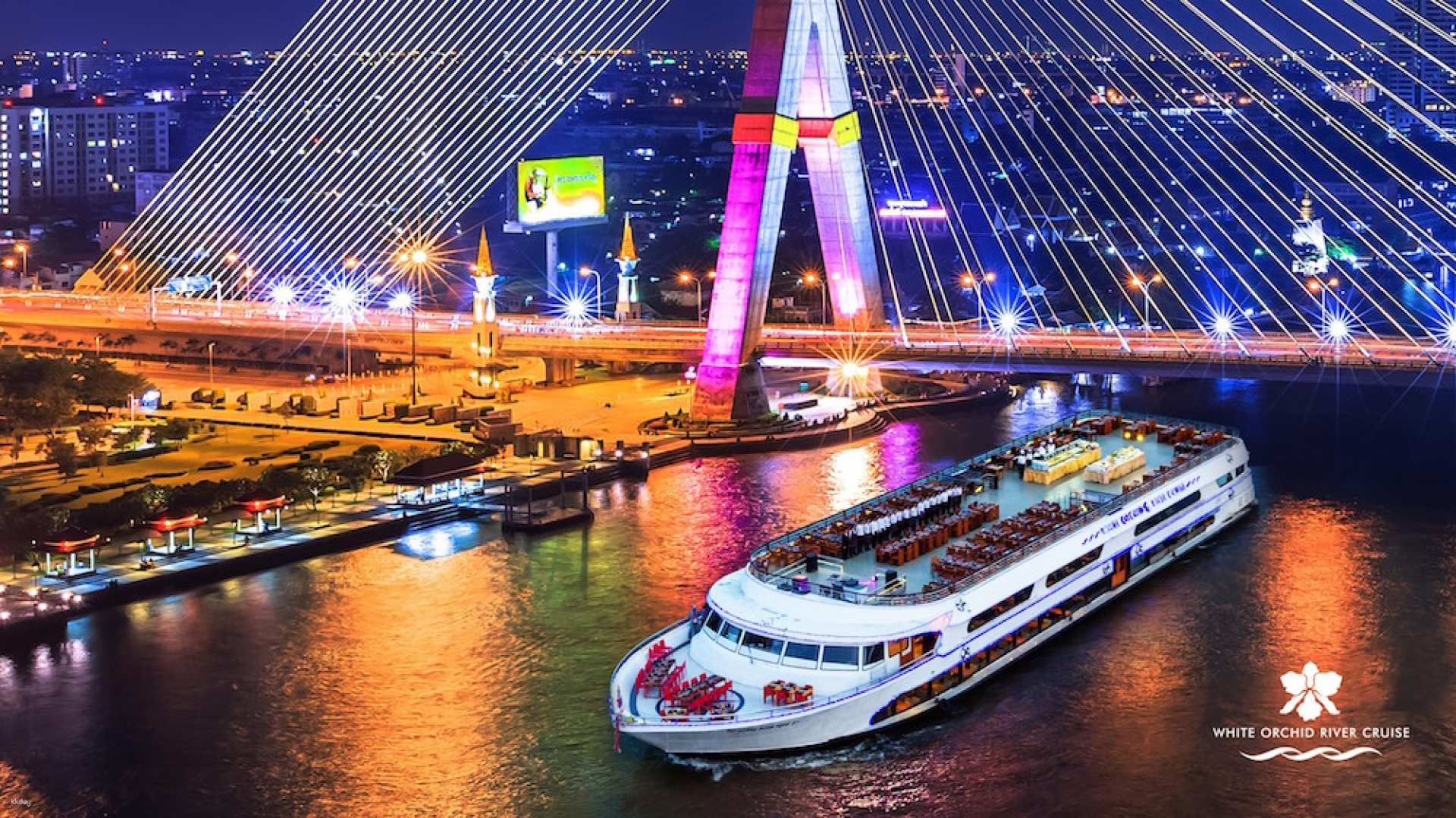 Experience the charm of Bangkok's skyline on the Chao Phraya River while enjoying a delectable buffet dinner and live entertainment aboard the elegant White Orchid cruise.
