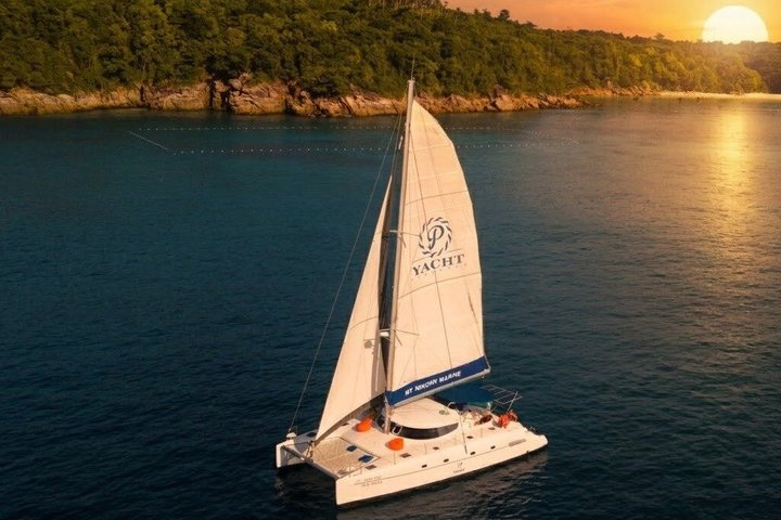 Coral Island Sunset Sailing Catamaran Half-Day Tour - Photo 1 of 20