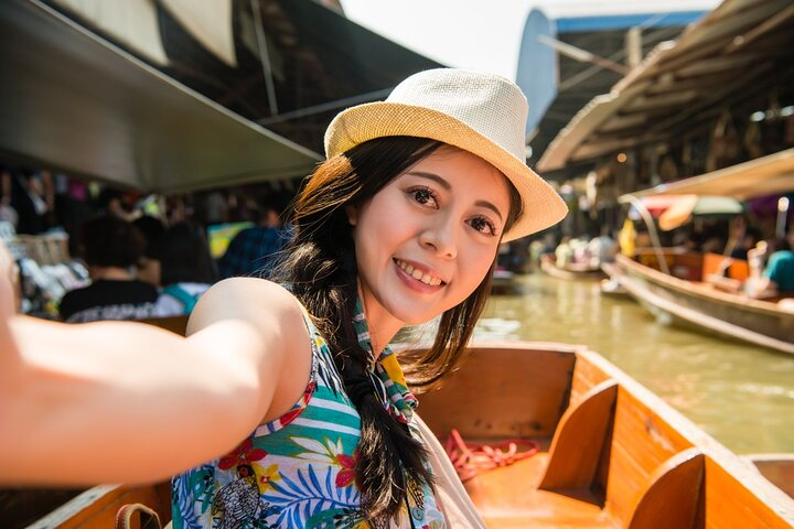 Immerse in the lively charm of the Damnoen Saduak Floating Market where colorful boats and vibrant local culture create unforgettable memories of your Thai adventure.