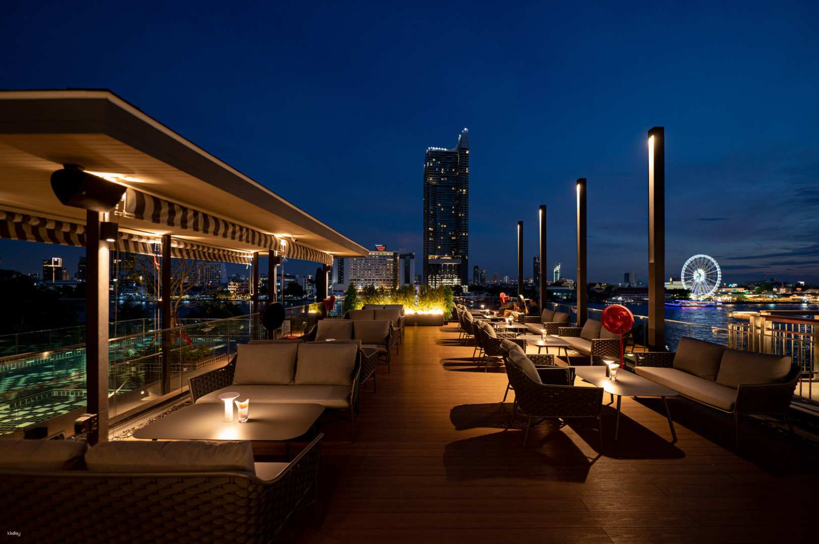 Sip signature cocktails while enjoying stunning views of the Chao Phraya River. Perfect for relaxed evenings Dark Waters Rooftop Bar is your go-to for memorable experiences in Bangkok.