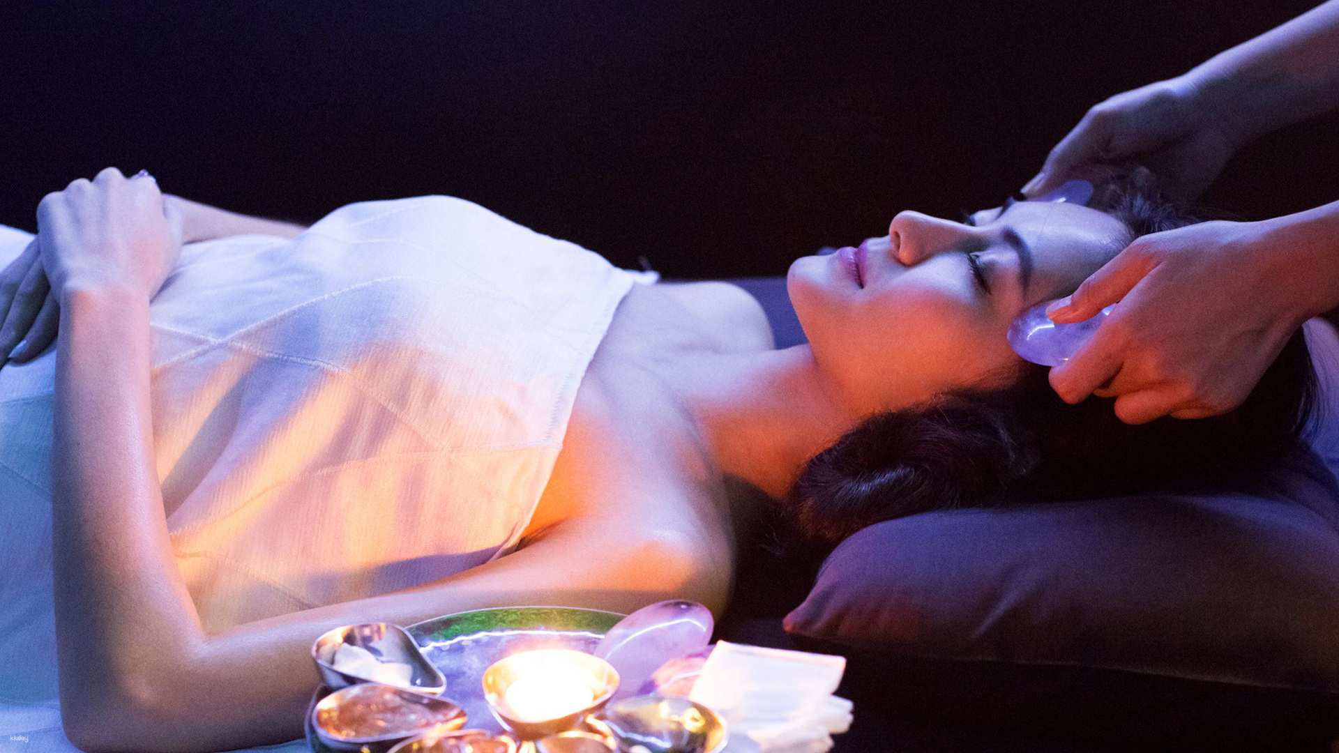 Relax and rejuvenate in a serene setting with innovative treatments using black jade all while enjoying the spa's stunning modern design at Dii Wellness Med Spa in Bangkok.