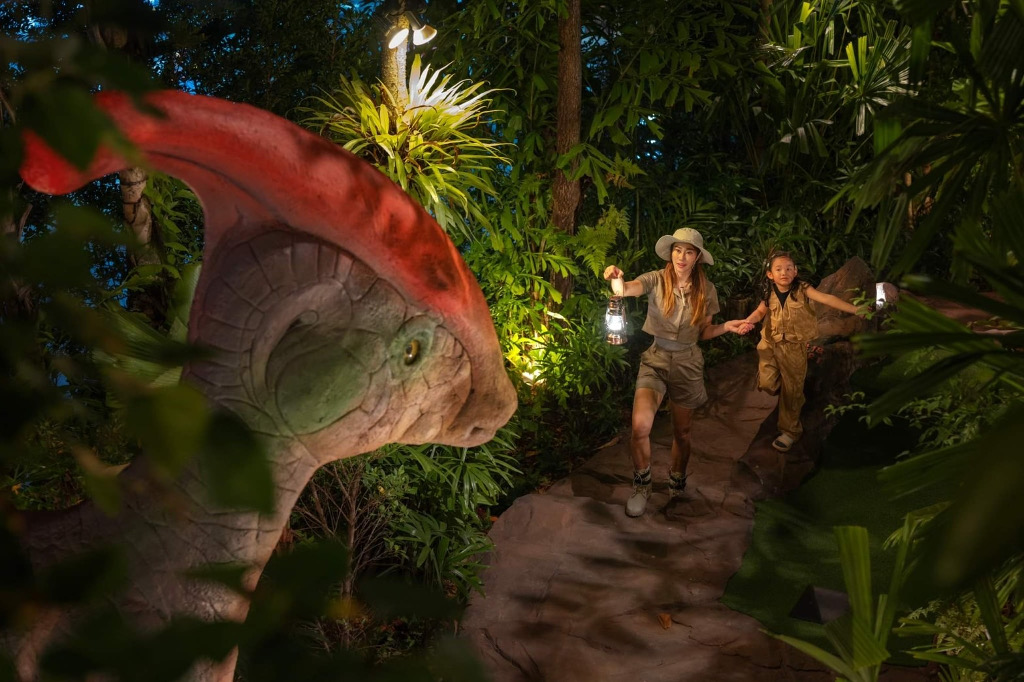 Step into a whimsical world at Dino Park Mini Golf where playful dinosaurs and lush greenery create a unique setting for family fun and friendly competition on Kata Beach.