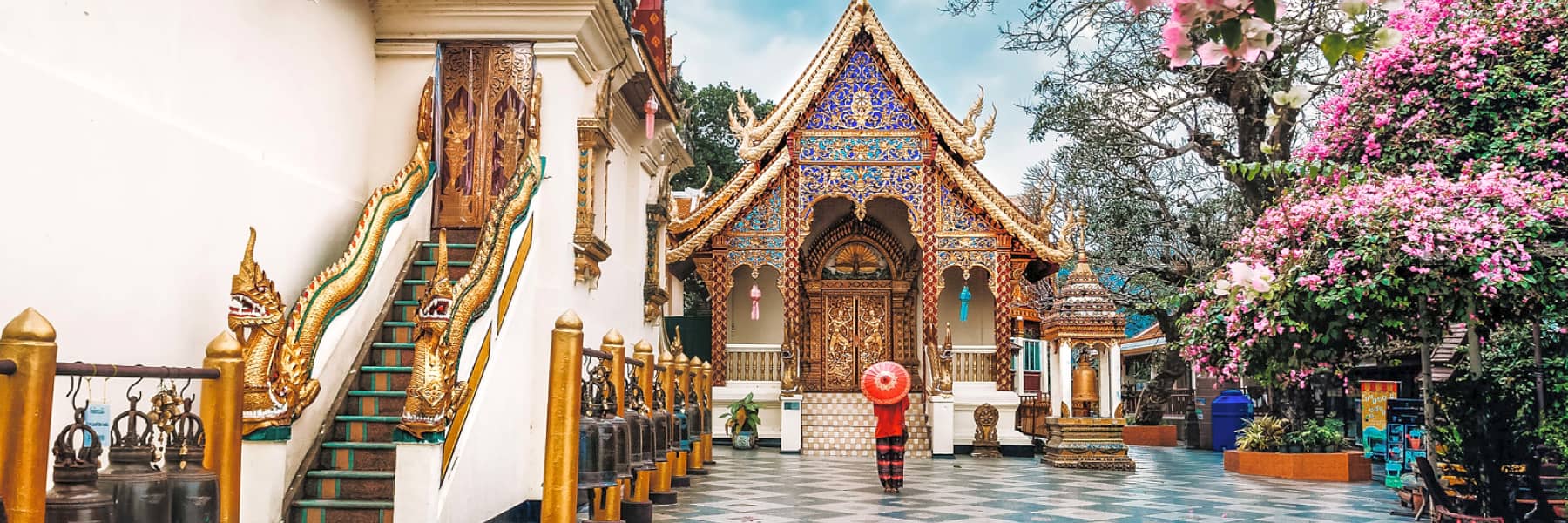 Experience the serene beauty of Wat Pha Lat surrounded by lush jungles and vibrant flora where each step offers a glimpse into local traditions and Buddhist practices.