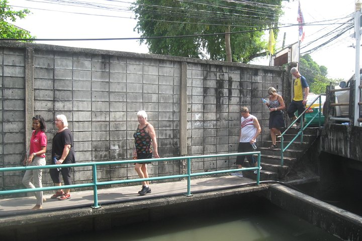 Experience the charm of Bangkok's local life as you meander through neighborhoods observing daily routines and savoring delicious bakery treats along the way. Discover hidden gems off the beaten path.