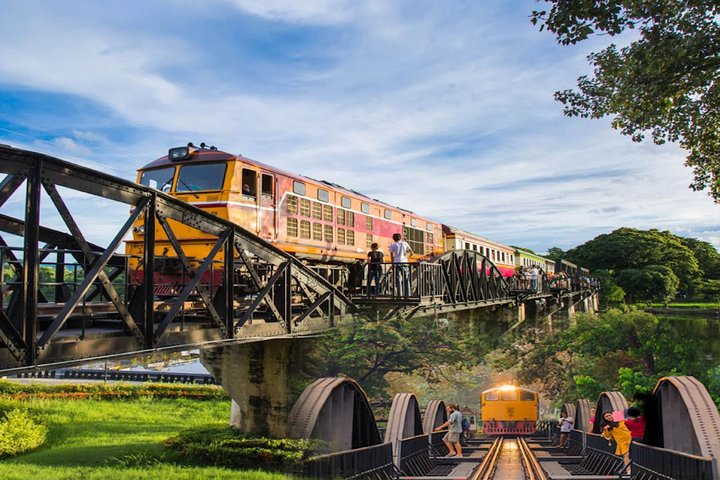 Experience the scenic beauty of the Bridge over the River Kwai where history meets lush landscapes perfect for exploring and discovering unique local treasures. A journey full of stories awaits.