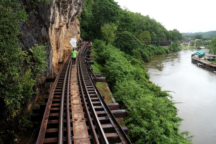 Discover the historic routes of Kanchanaburi where the remnants of the Death Railway and lush landscapes tell stories of resilience and remembrance inviting travelers to explore rich cultural heritage.