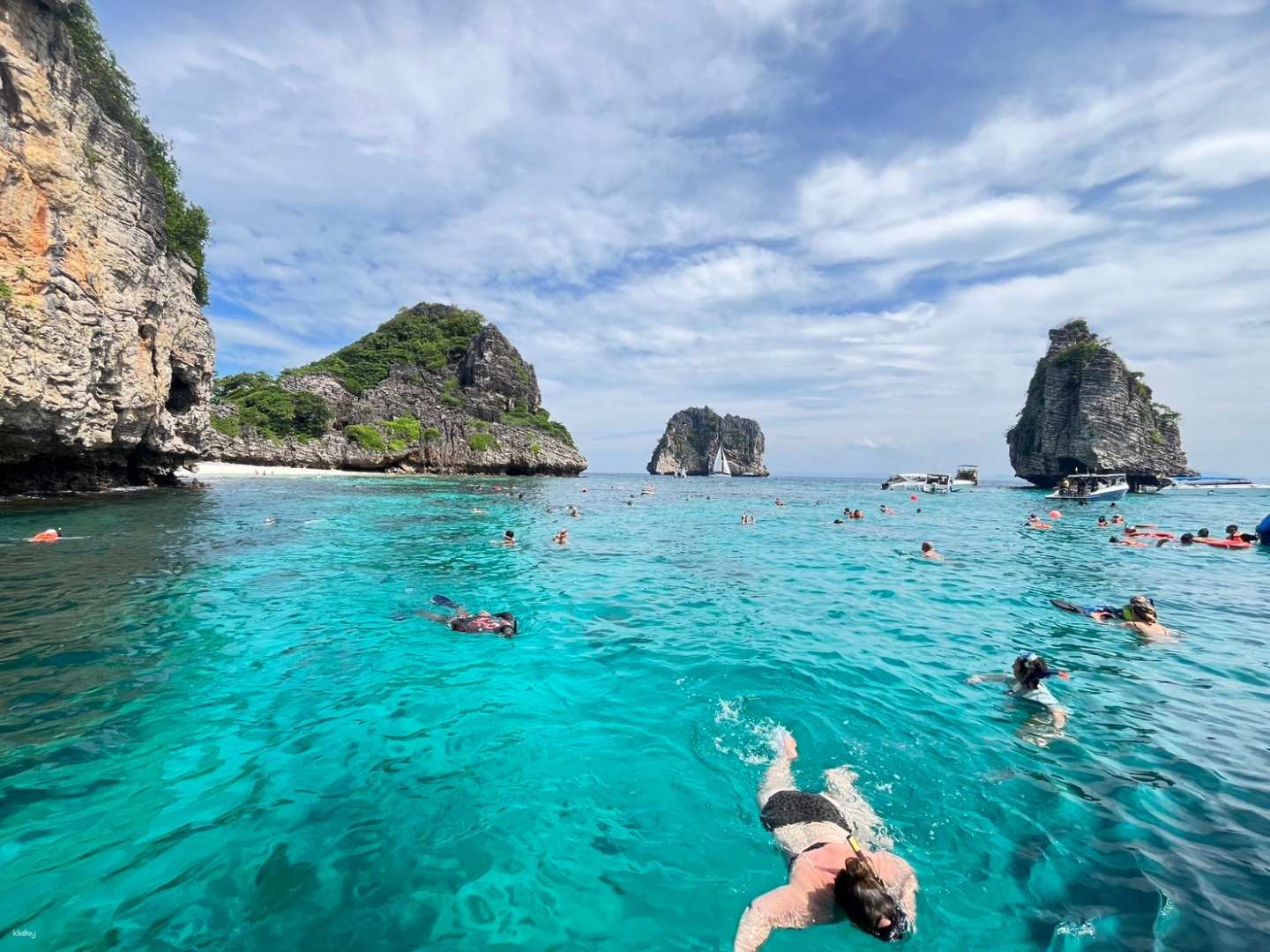 Experience crystal-clear waters while snorkeling in Koh Haa and Koh Rok surrounded by stunning rock formations and vibrant marine life perfect for an unforgettable island adventure.
