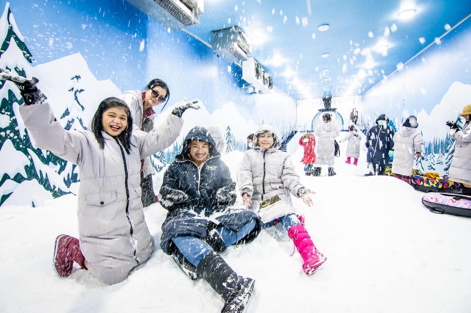 Experience the magic of winter in Thailand where snow art and culture blend seamlessly. Explore whimsical ice sculptures and playful moments in a mesmerizing frozen landscape.