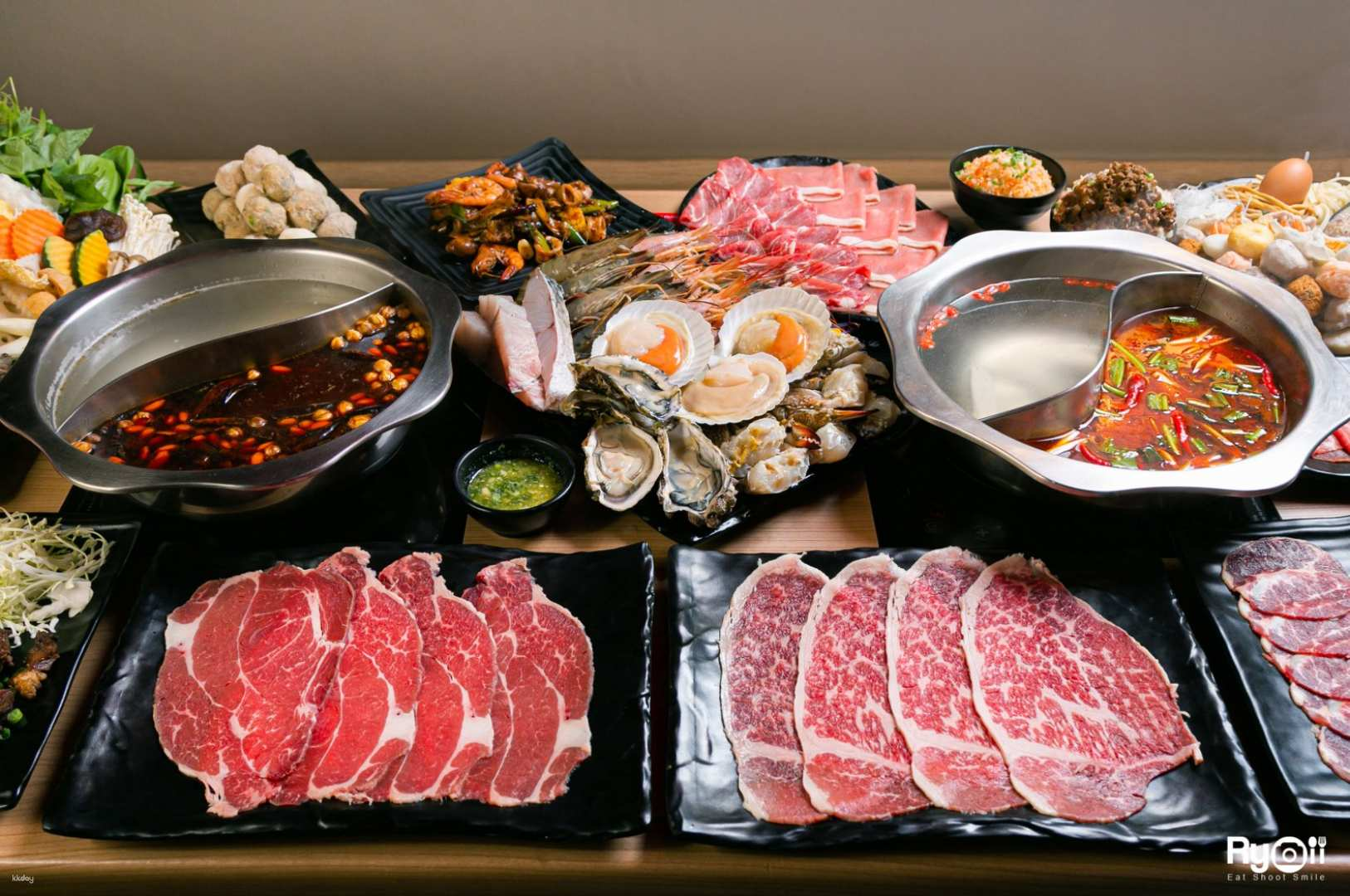 Savor the taste of Taiwan with a traditional shabu buffet featuring an array of fresh ingredients and premium quality meats perfect for food enthusiasts exploring Bangkok's culinary scene.