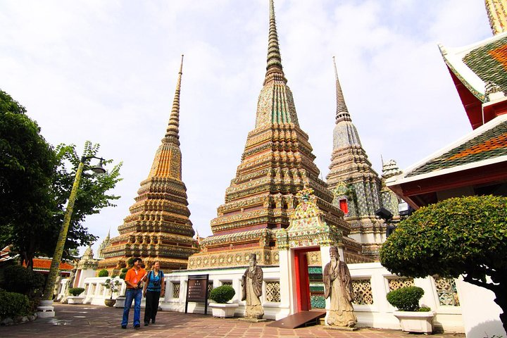 Explore the stunning temple spires and intricate designs of Bangkok's sacred sites immersing yourself in the rich Buddhist heritage and breathtaking architecture that define this iconic city.