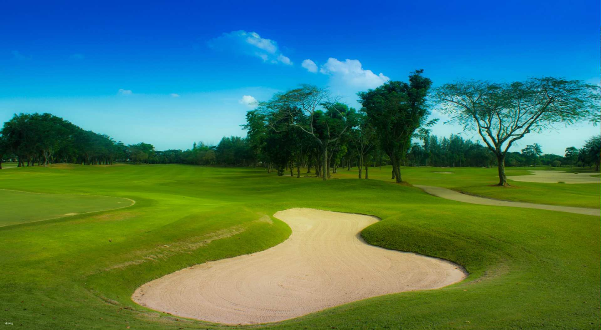 Play amidst stunning landscapes at Bangkok's only Jack Nicklaus-designed golf course featuring well-kept fairways serene lakes and unique challenges that cater to every golfer.