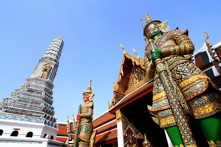 Marvel at the intricate details of the Grand Palace where rich history meets stunning architecture with towering spires and majestic sculptures inviting exploration and discovery in Bangkok.