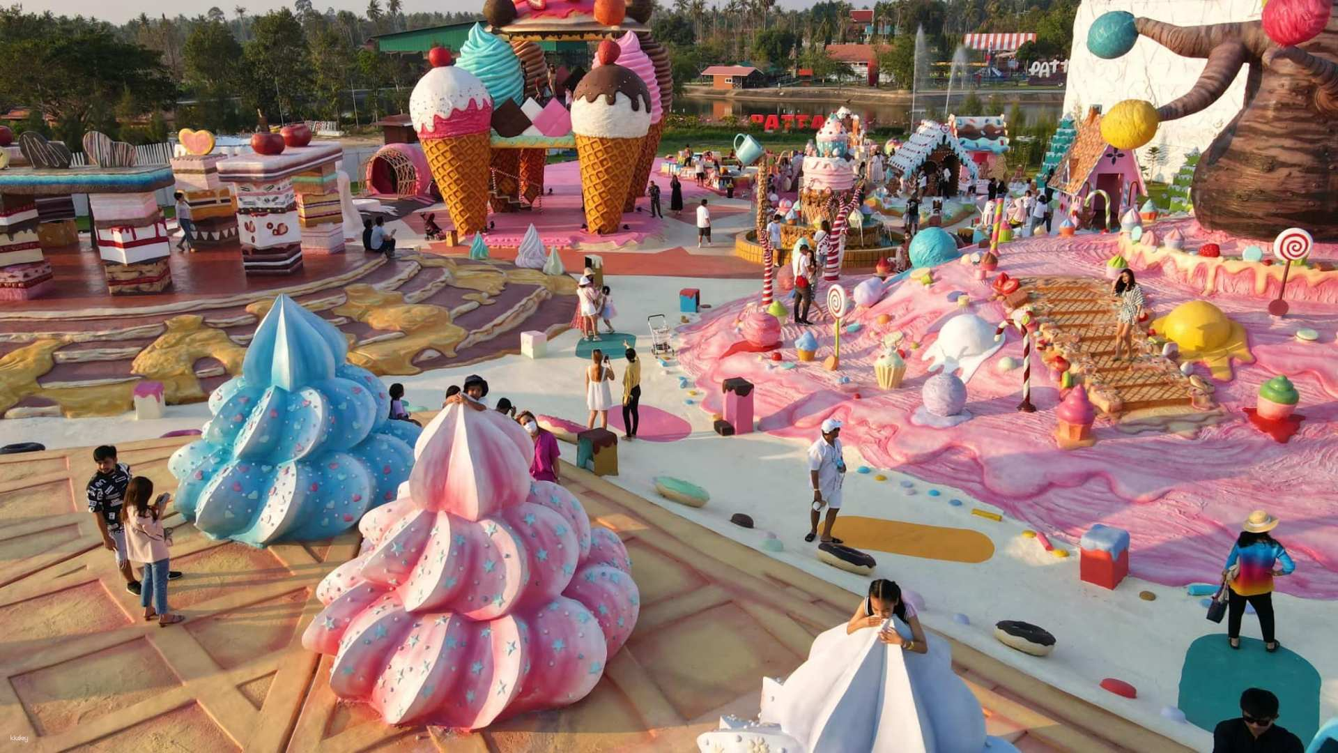 Step into a whimsical world of giant desserts where candy trees and ice cream sculptures invite joyful exploration. Perfect for families and dessert lovers alike this destination promises delightful memories.