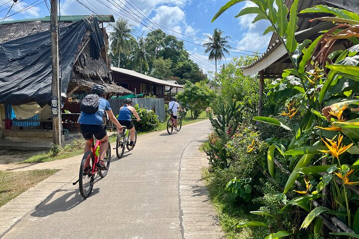 Experience the beauty of Ao Nang Krabi as you cycle along scenic paths exploring hidden villages and lush landscapes while creating unforgettable memories in this unique biking adventure.