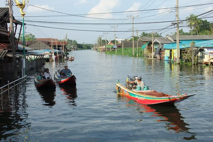 Experience the charm of rural canal life as you glide through peaceful waterways exploring local markets and savoring authentic cuisine in the heart of Bangkok’s hidden gems.