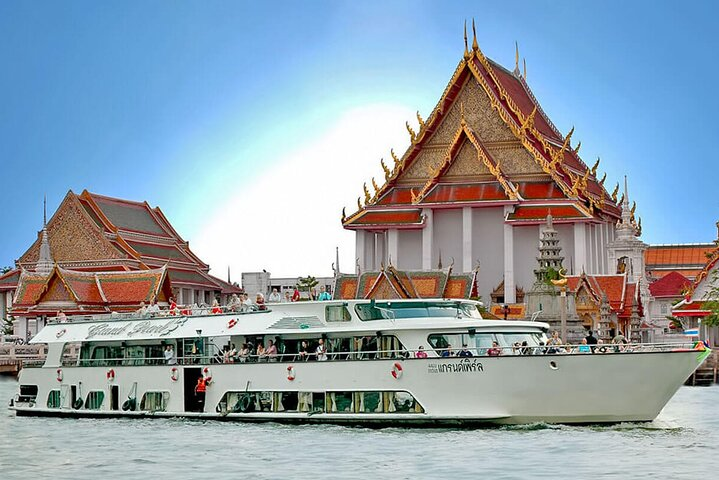 Sail along the Chao Phraya River surrounded by majestic temples and serene landscapes as you explore the rich history of Ayutthaya on this unforgettable cruise experience.