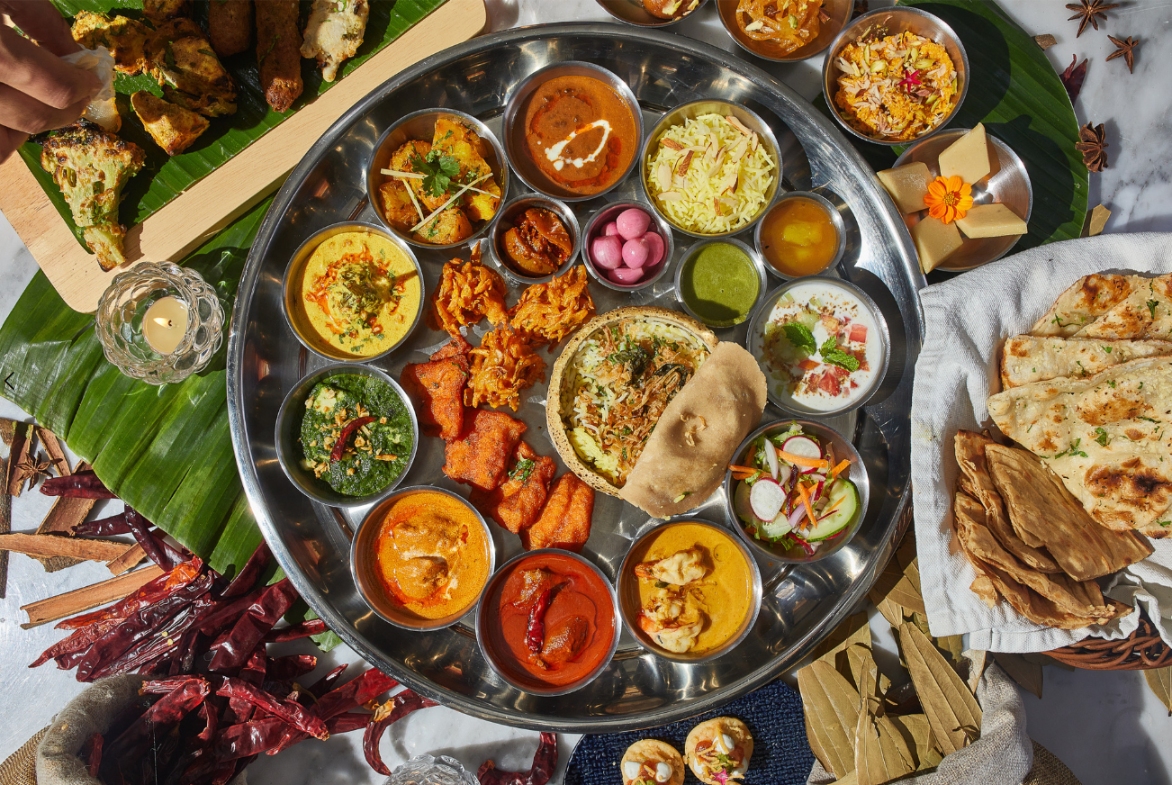 Savor the essence of Mughalai cuisine with an exquisite spread featuring rich flavors and vibrant colors that invite a delightful culinary journey at Indus Bangkok.