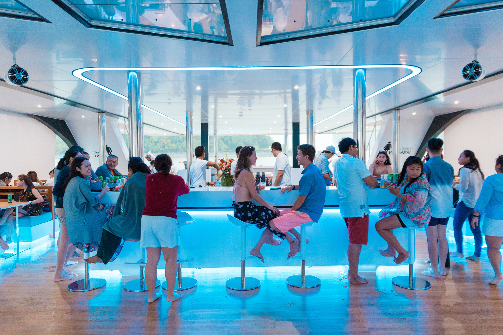 Step aboard a luxurious catamaran and unwind with friends at the stylish bar. Enjoy stunning sea views while savoring delightful meals and engaging in fun water activities throughout the day.