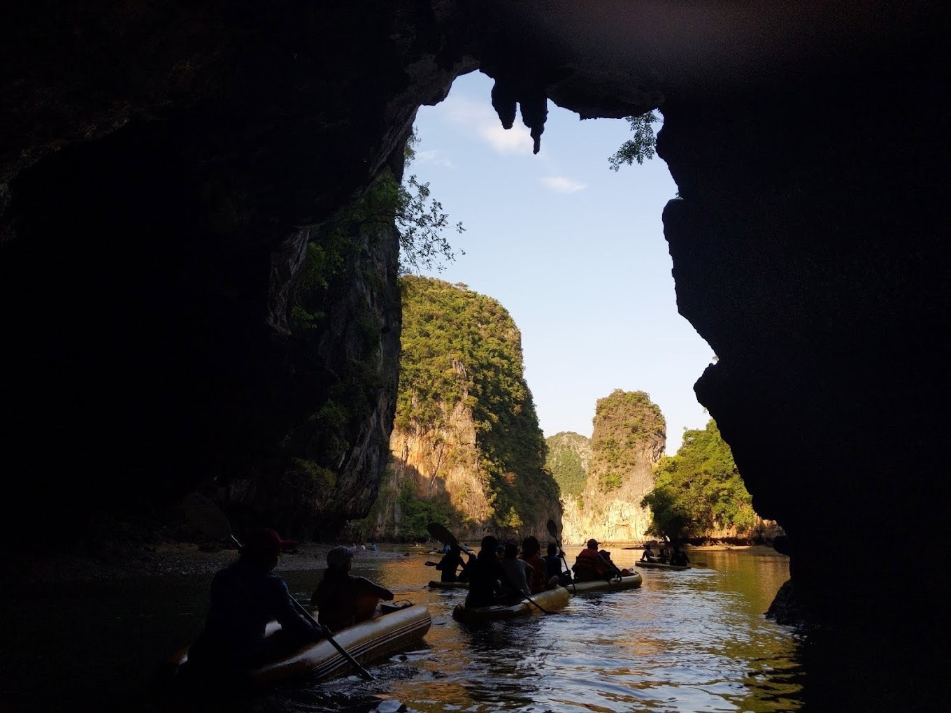 Paddle through limestone caves exploring hidden lagoons while savoring a seafood buffet. End your day with a serene floating Krathong under a glowing sky creating unforgettable memories.