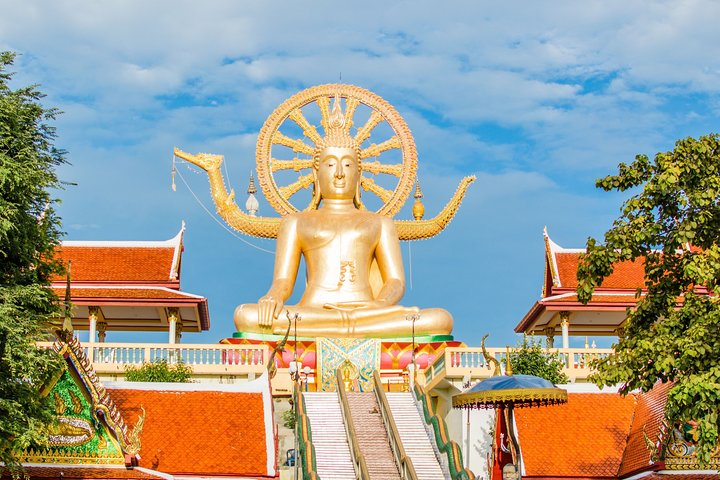 Experience the serene beauty of Koh Samui's Big Buddha temple where the peaceful ambiance invites reflection and offers stunning views making it a perfect spot for memorable photos and cultural immersion.