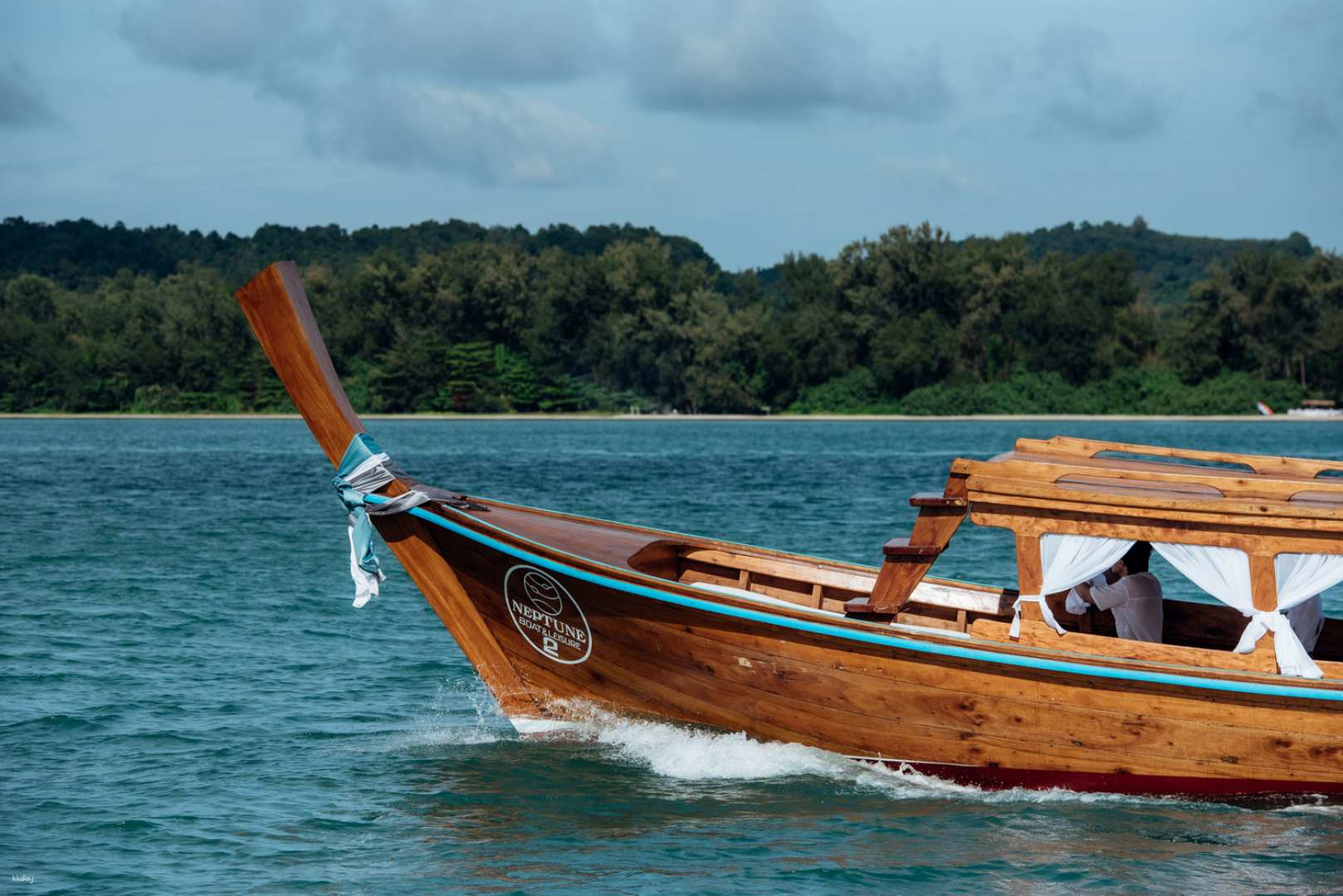 Experience the serene beauty of Krabi as you sail in luxury aboard a private longtail boat surrounded by stunning island views and the calming waters of the Andaman Sea.