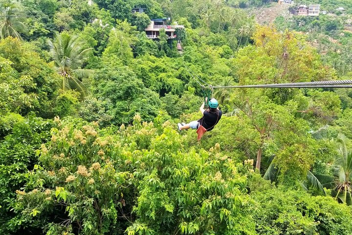 Soar through the jungle canopy taking in sweeping views of Koh Samui while ziplining above lush greenery. Experience the refreshing mists of waterfalls and the unique fish spa below.