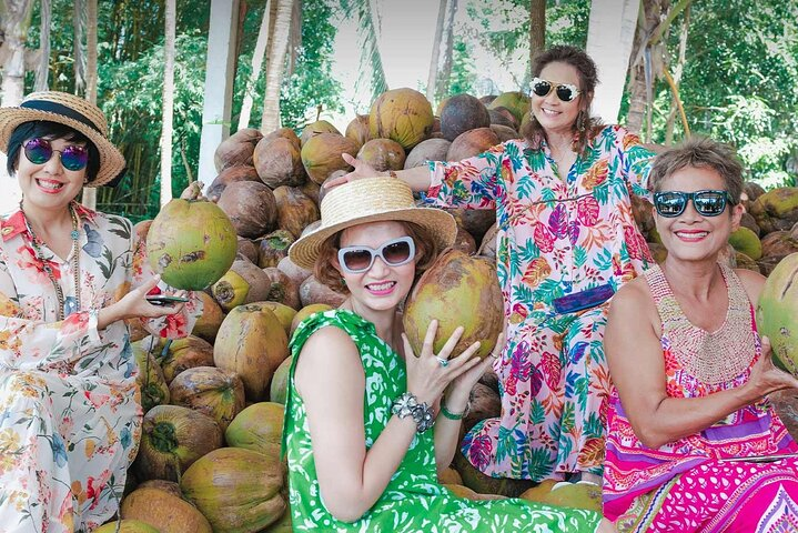 Experience the charm of local culture while enjoying hands-on activities from exploring tropical fruits to indulging in delicious Thai cuisine all captured in joyful moments.